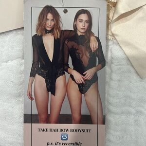 Brand new with tags cream reversible body suit